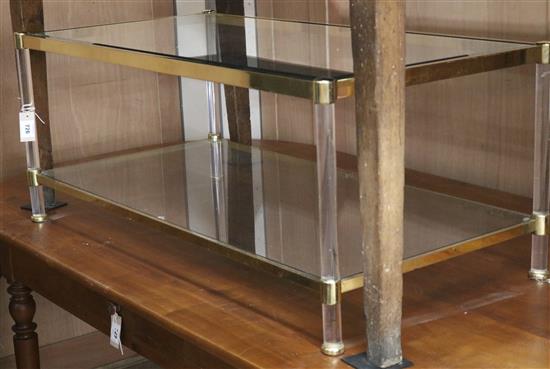 A gilt metal glass and lucite two tier coffee table W.111cm